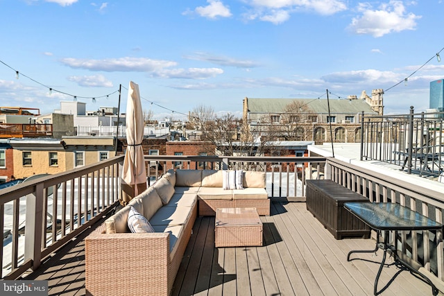 deck featuring outdoor lounge area