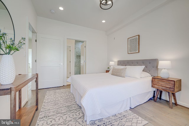 bedroom featuring light wood-type flooring and recessed lighting