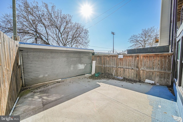 view of patio / terrace featuring fence