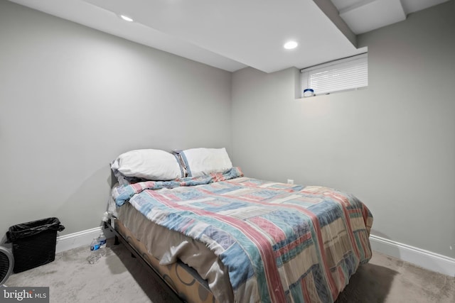 carpeted bedroom featuring recessed lighting and baseboards