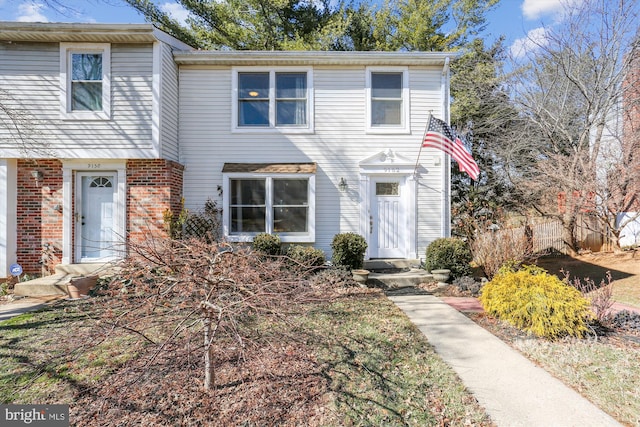 view of front of property with brick siding