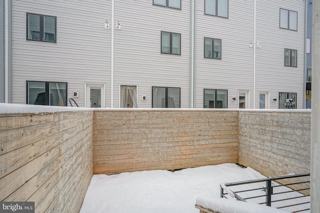 view of snow covered patio