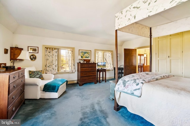 bedroom with lofted ceiling, a baseboard radiator, baseboards, and carpet flooring