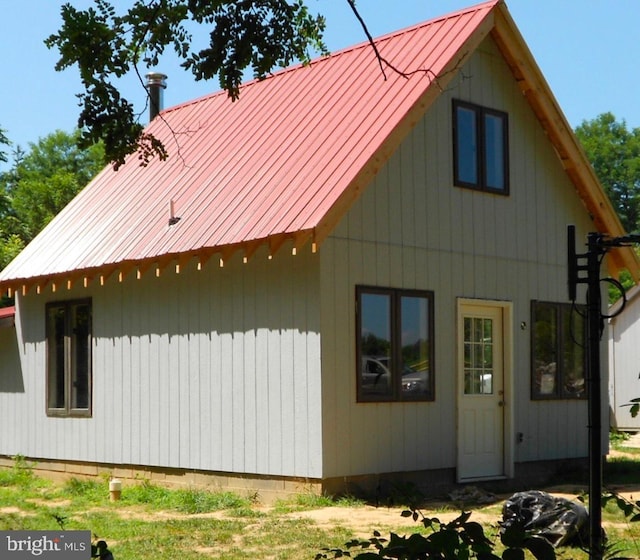 view of home's exterior with metal roof