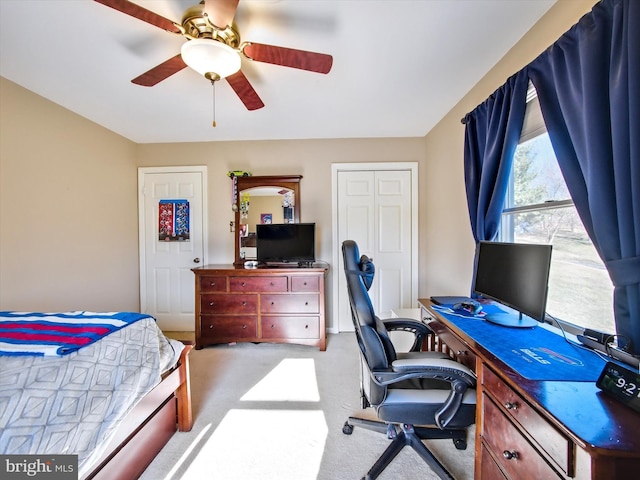 bedroom with carpet flooring and a ceiling fan