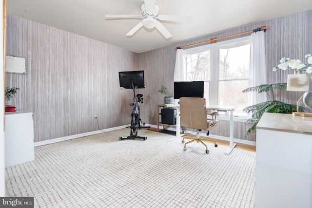 home office featuring ceiling fan, baseboards, and wallpapered walls