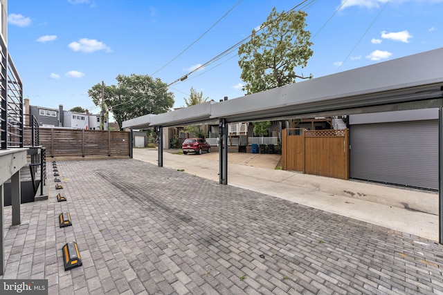 view of patio / terrace featuring fence