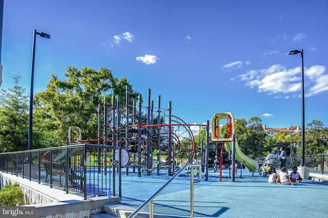 community jungle gym with fence