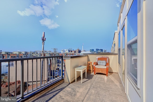 balcony featuring a city view