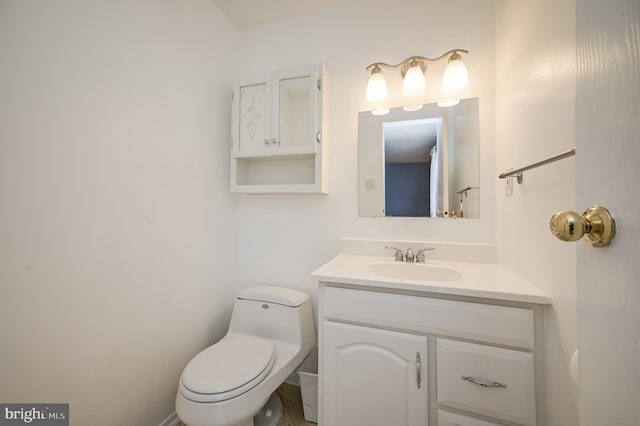 half bath with toilet and vanity