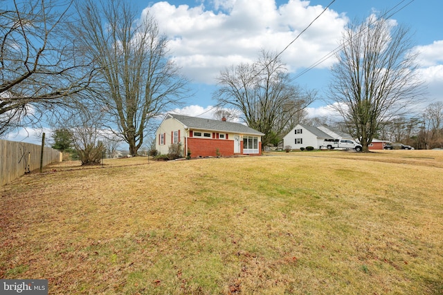 view of yard featuring fence