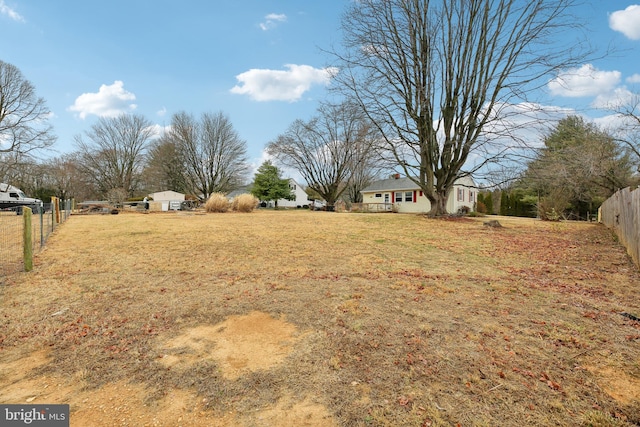 view of yard featuring fence