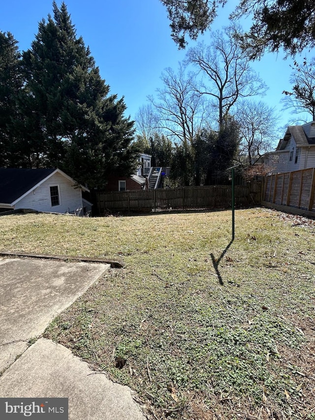 view of yard with fence