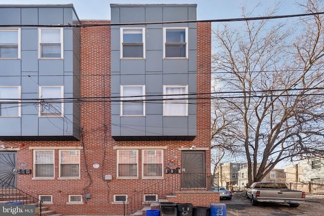 view of front facade with brick siding