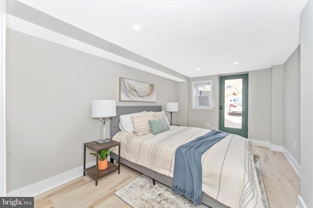 bedroom featuring recessed lighting, baseboards, and wood finished floors