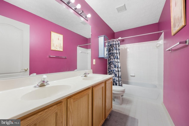 full bath with toilet, a textured ceiling, visible vents, and a sink