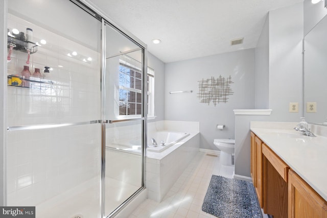 bathroom with a textured ceiling, a garden tub, tile patterned flooring, visible vents, and a stall shower