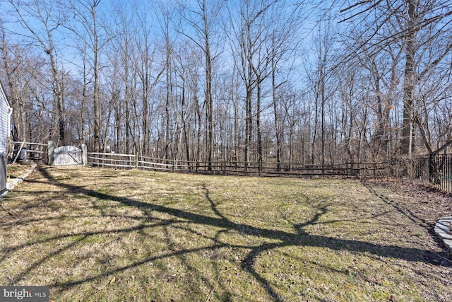 view of yard with a fenced backyard