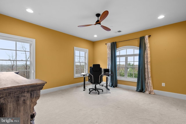 office featuring baseboards, visible vents, and carpet flooring