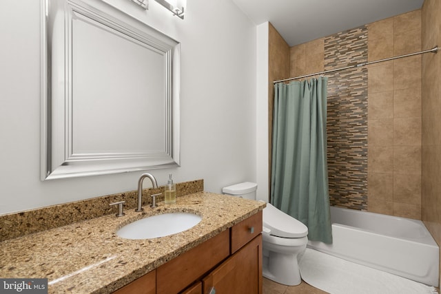 bathroom featuring tile patterned flooring, vanity, toilet, and shower / bath combo with shower curtain