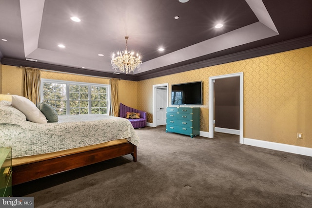 bedroom featuring baseboards, wallpapered walls, a tray ceiling, and crown molding