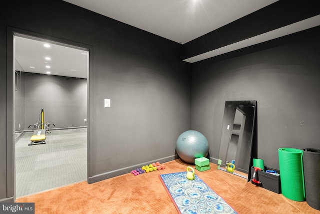 exercise area with carpet, baseboards, and recessed lighting