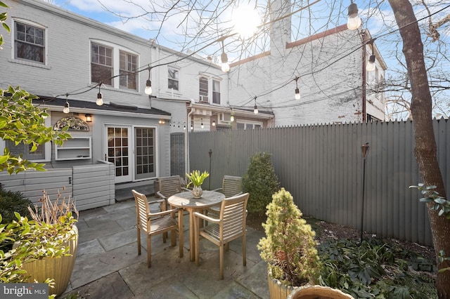 view of patio / terrace with a fenced backyard and outdoor dining area