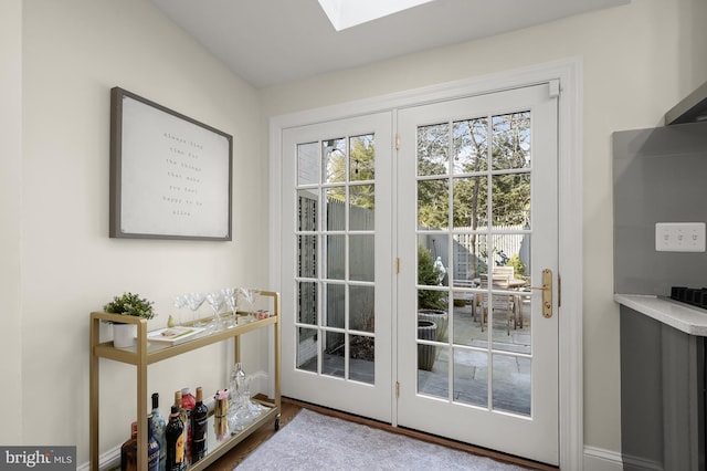 doorway featuring a skylight