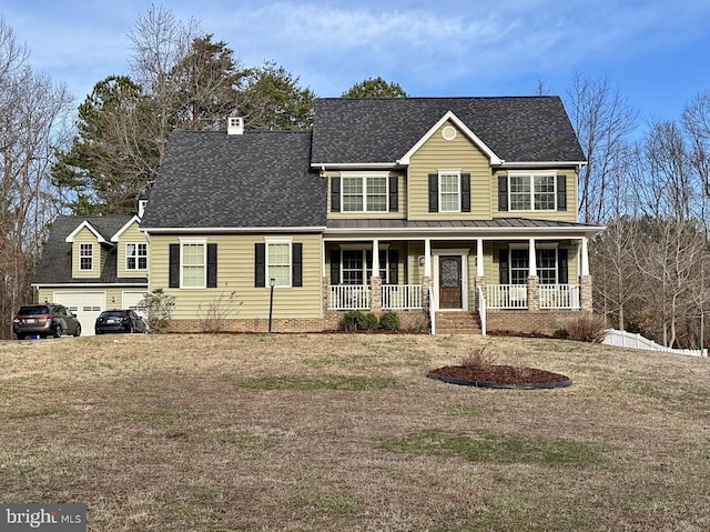 view of front of property featuring covered porch, a garage, and roof with shingles