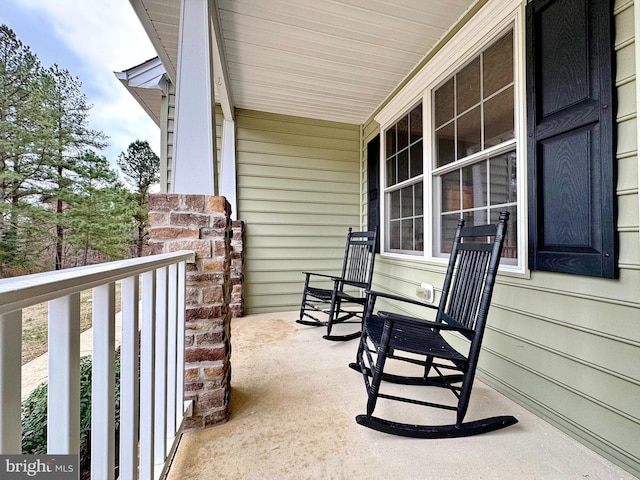 balcony featuring a porch