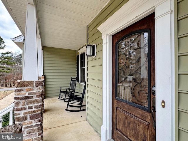 entrance to property with covered porch