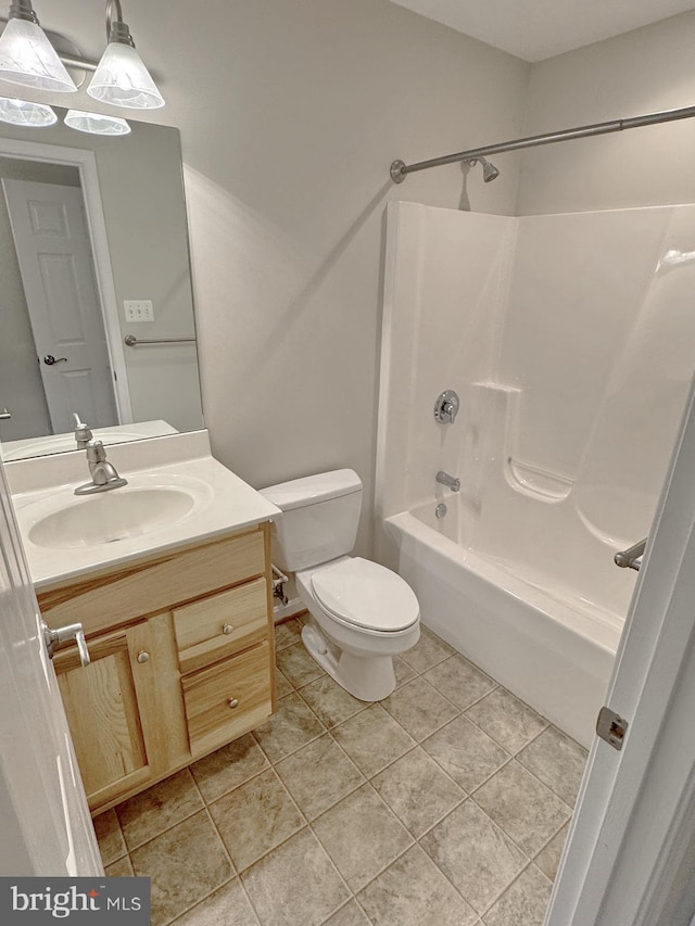 full bath featuring tile patterned flooring, toilet, vanity, and shower / bath combination