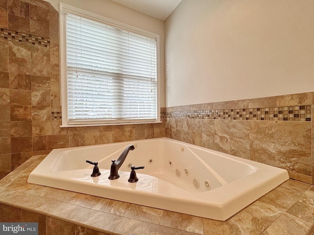 bathroom featuring a whirlpool tub