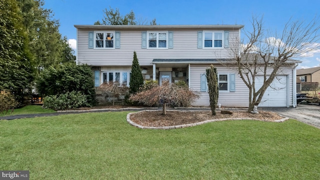 view of front of property with aphalt driveway, a front lawn, and a garage