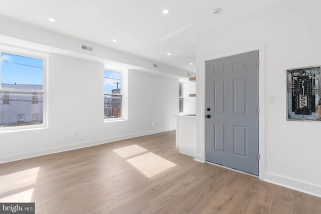 entrance foyer featuring recessed lighting, baseboards, visible vents, and light wood finished floors