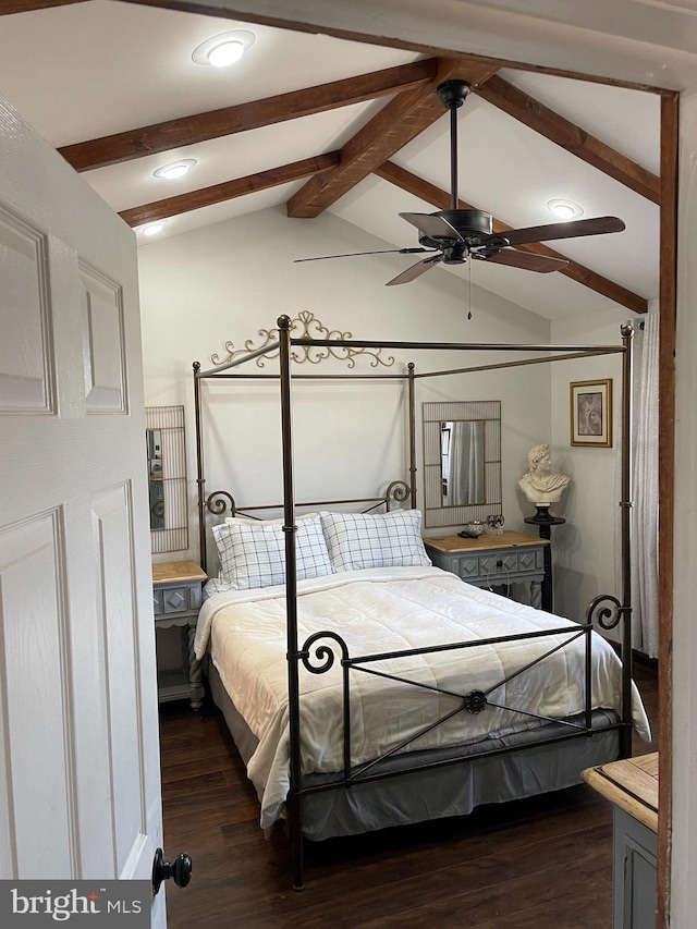 bedroom with vaulted ceiling with beams and dark wood finished floors