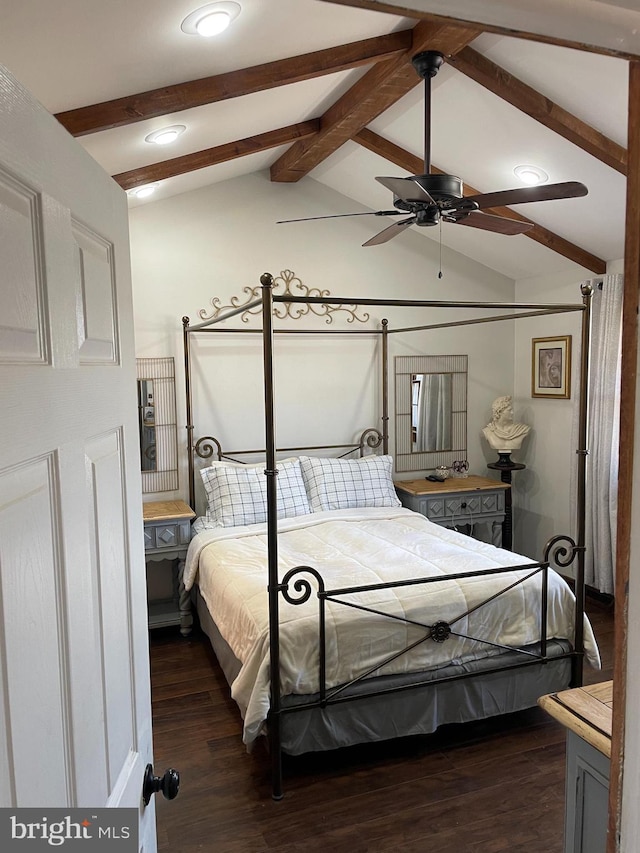 bedroom with dark wood-type flooring and lofted ceiling with beams