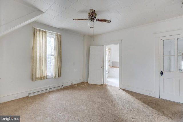 interior space featuring crown molding, carpet flooring, connected bathroom, and baseboard heating