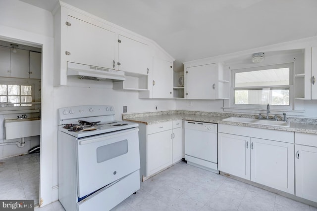 kitchen with white appliances, under cabinet range hood, open shelves, and a sink