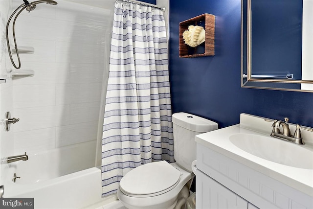 full bath with vanity, toilet, and shower / bath combo with shower curtain