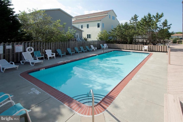 pool featuring fence