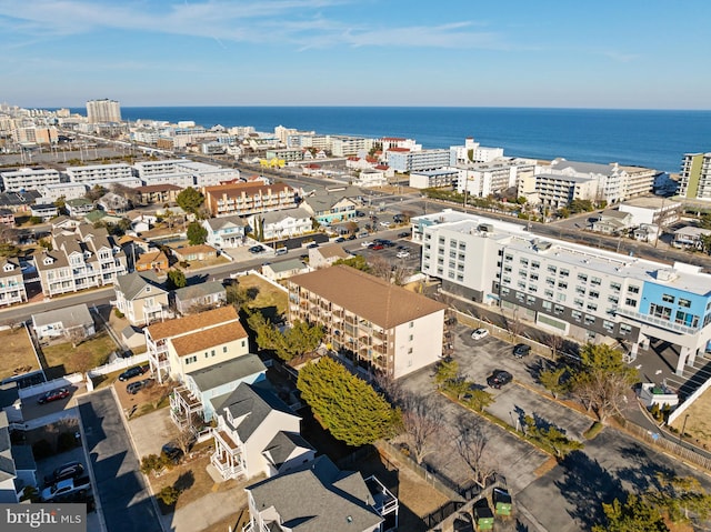 aerial view featuring a water view and a city view