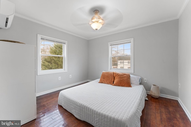 bedroom featuring ornamental molding, dark wood finished floors, and baseboards