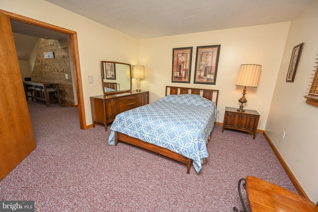 carpeted bedroom with baseboards