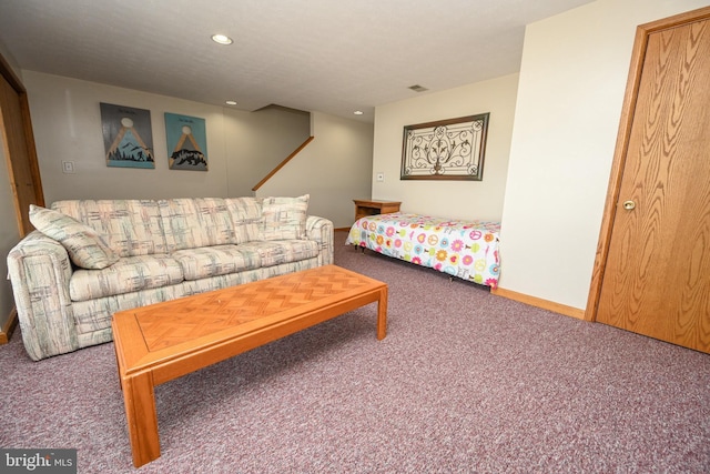 living area with carpet, baseboards, and recessed lighting