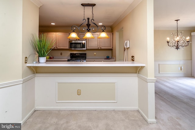 kitchen with carpet floors, black gas stove, a peninsula, ornamental molding, and stainless steel microwave