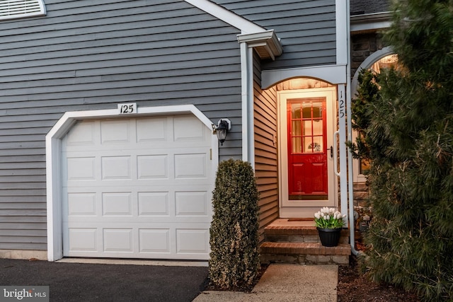 entrance to property with a garage