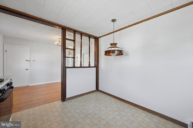 unfurnished dining area featuring visible vents and baseboards