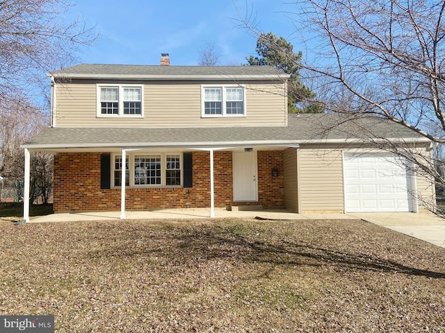 traditional home with covered porch, brick siding, a chimney, and an attached garage