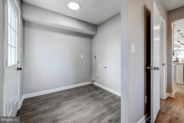 laundry area with washer hookup, plenty of natural light, wood finished floors, and electric dryer hookup